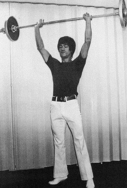 Bruce Lee performing the Clean & Press